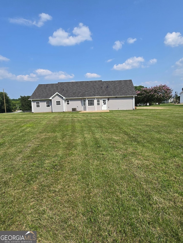 388 Kay Dr, Winder, GA 30680 - rear view of property with a lawn