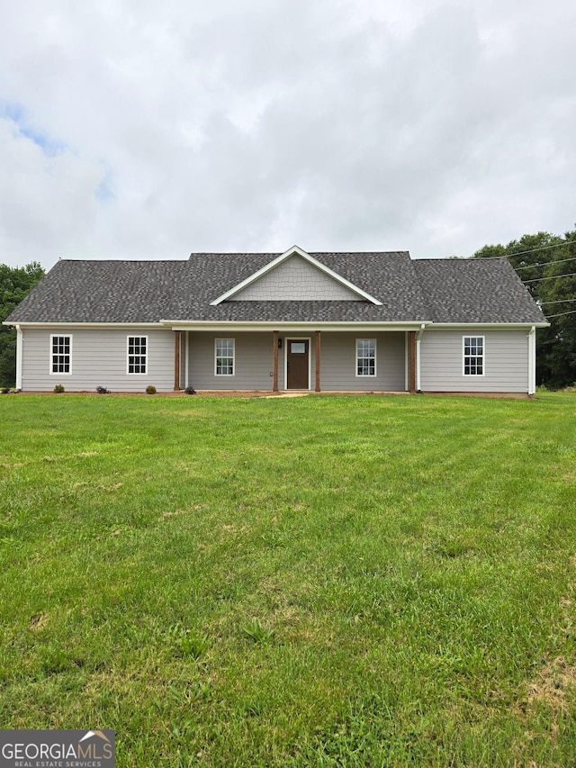 388 Kay Dr, Winder, GA 30680 - view of front of home featuring a front lawn and roof with shingles