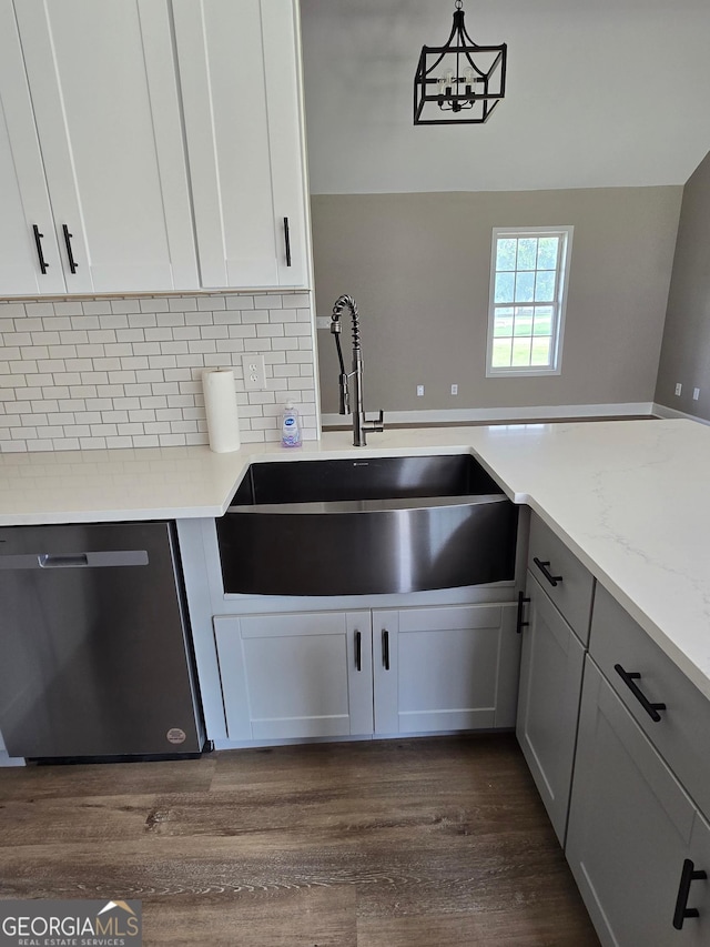 388 Kay Dr, Winder, GA 30680 - kitchen with dishwasher, dark wood-style floors, decorative backsplash, and white cabinets