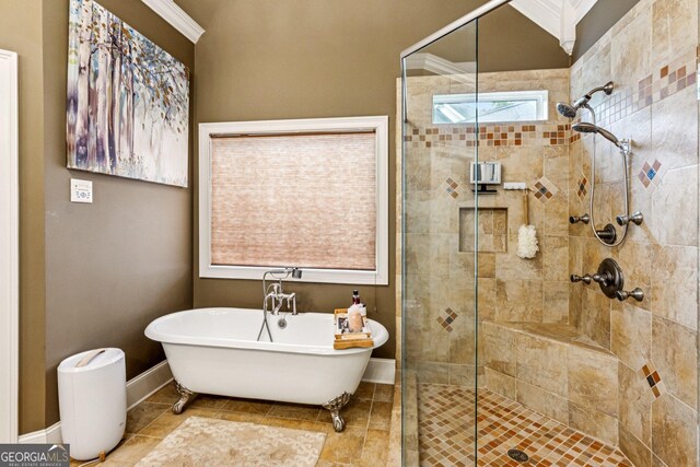 5717 Meadow View Dr, Jefferson, GA 30549 - full bath featuring a stall shower, a soaking tub, and crown molding
