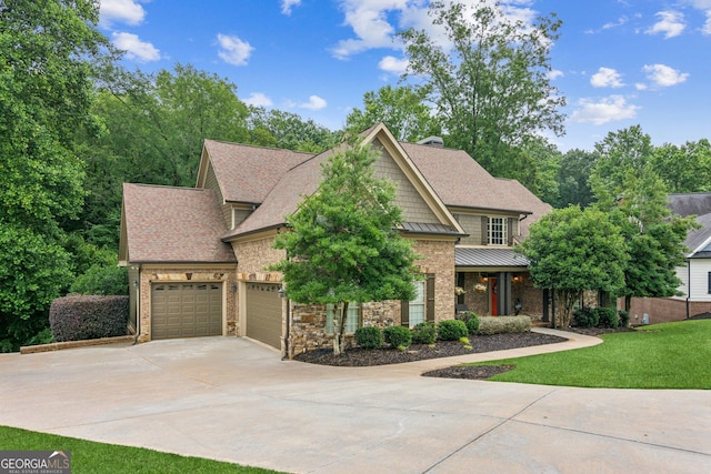 5717 Meadow View Dr, Jefferson, GA 30549 - craftsman house featuring concrete driveway, a shingled roof, a front yard, a garage, and a standing seam roof