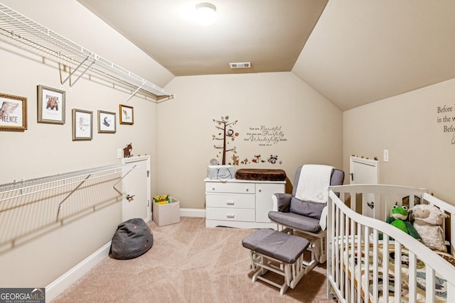 5717 Meadow View Dr, Jefferson, GA 30549 - carpeted bedroom featuring a nursery area and vaulted ceiling