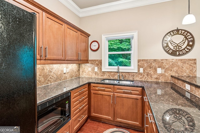 5717 Meadow View Dr, Jefferson, GA 30549 - kitchen with black appliances, ornamental molding, brown cabinetry, dark stone countertops, and tasteful backsplash