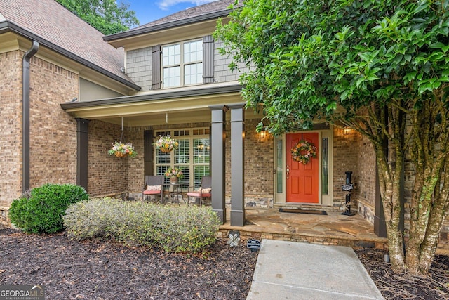 5717 Meadow View Dr, Jefferson, GA 30549 - entrance to property with a porch, brick siding, and a shingled roof