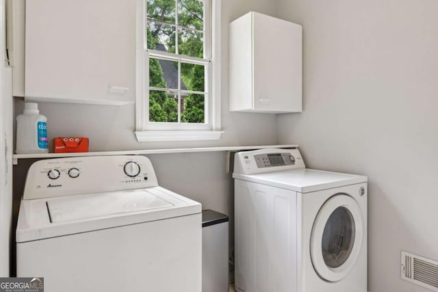 878 Treadstone Overlook, Suwanee, GA 30024 - washroom with washer and dryer and cabinet space
