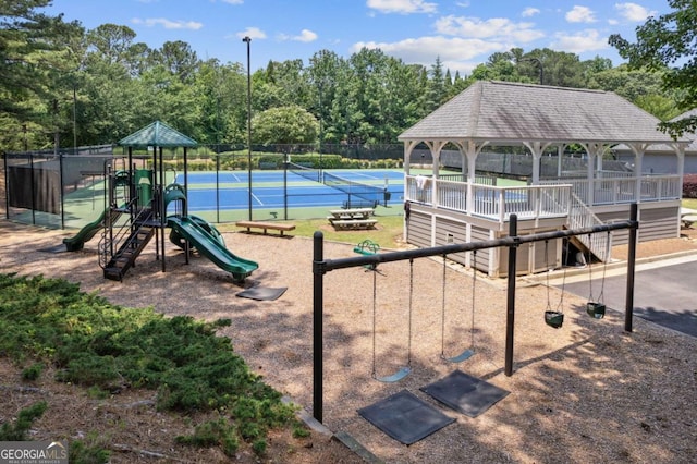 878 Treadstone Overlook, Suwanee, GA 30024 - communal playground with view of scattered trees and a tennis court