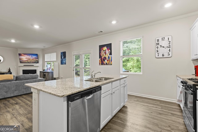 545 Quail Pass, Dawsonville, GA 30534 - kitchen featuring stainless steel appliances, crown molding, a center island with sink, white cabinets, and dark wood-type flooring