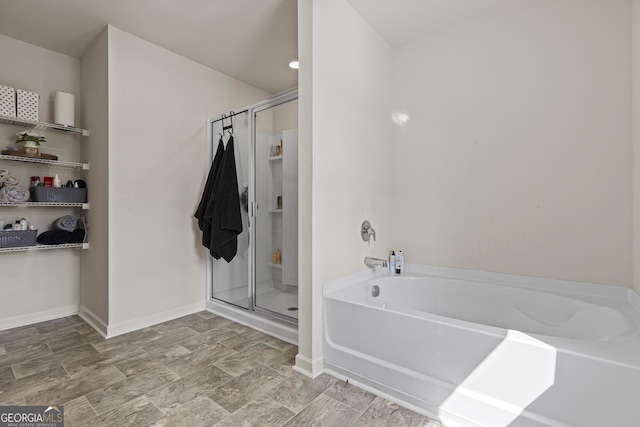 545 Quail Pass, Dawsonville, GA 30534 - full bathroom featuring a stall shower and a garden tub