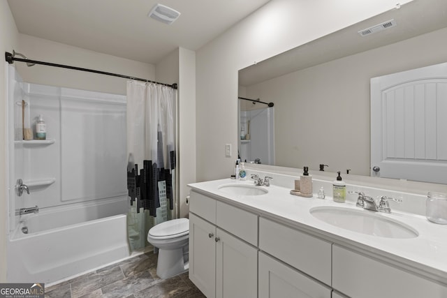 545 Quail Pass, Dawsonville, GA 30534 - bathroom featuring shower / bath combo, double vanity, and stone finish floors