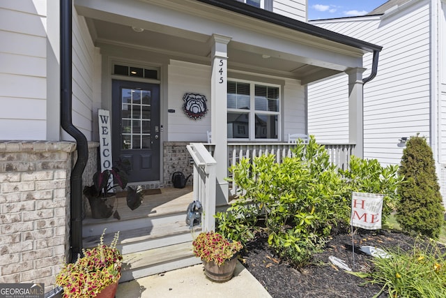 545 Quail Pass, Dawsonville, GA 30534 - doorway to property featuring a porch