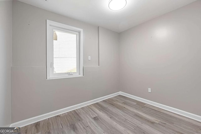 1455 Holleybrooke Dr, Alpharetta, GA 30004 - spare room with wood finished floors and baseboards