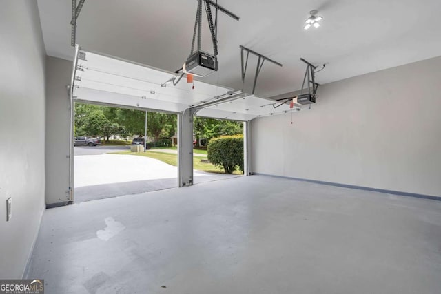 1455 Holleybrooke Dr, Alpharetta, GA 30004 - garage featuring a garage door opener