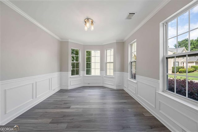 1455 Holleybrooke Dr, Alpharetta, GA 30004 - unfurnished dining area featuring healthy amount of natural light, a wainscoted wall, ornamental molding, a decorative wall, and dark wood-type flooring