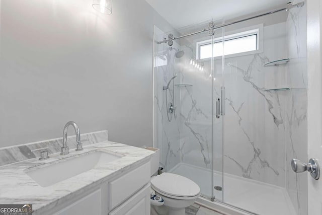 1455 Holleybrooke Dr, Alpharetta, GA 30004 - bathroom featuring a marble finish shower and vanity