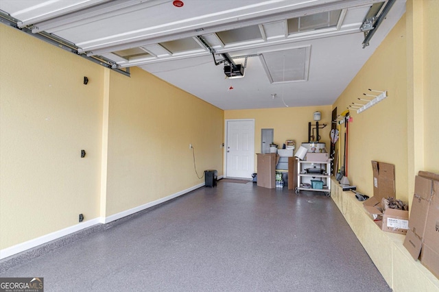 2204 Applebrook Dr, Rossville, GA 30741 - garage featuring a garage door opener and electric panel