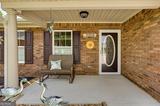 2204 Applebrook Dr, Rossville, GA 30741 - doorway to property featuring brick siding and a porch