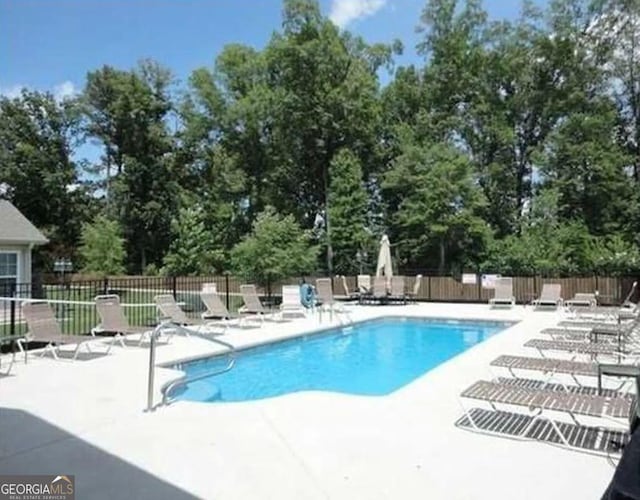 2204 Applebrook Dr, Rossville, GA 30741 - community pool with a patio area and view of wooded area