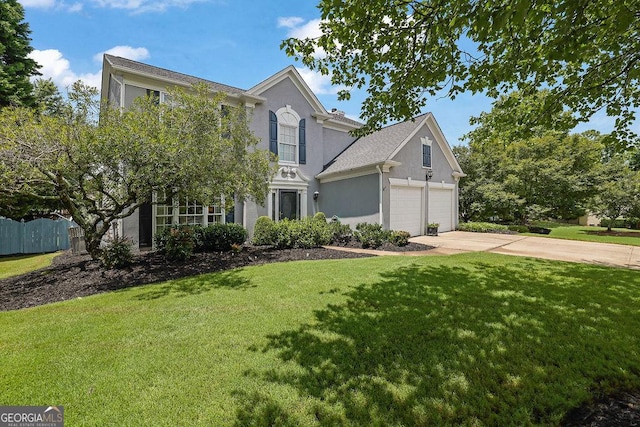 7325 Brookwood Way, Cumming, GA 30041 - traditional-style home with stucco siding, driveway, and a garage