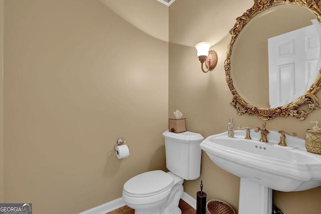 7325 Brookwood Way, Cumming, GA 30041 - bathroom with a sink and wood finished floors