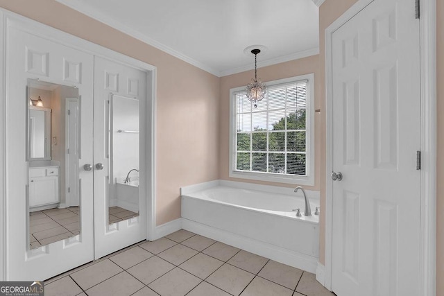 7325 Brookwood Way, Cumming, GA 30041 - bathroom featuring a garden tub, tile patterned floors, crown molding, and a chandelier