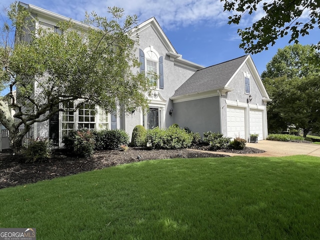 7325 Brookwood Way, Cumming, GA 30041 - view of front of home with stucco siding, a front yard, a garage, concrete driveway, and a shingled roof