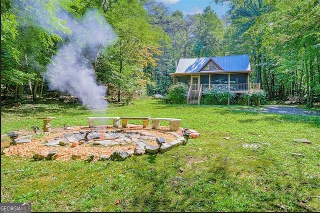 9947 Doublehead Gap Rd, Blue Ridge, GA 30513 - view of green lawn featuring a forest view