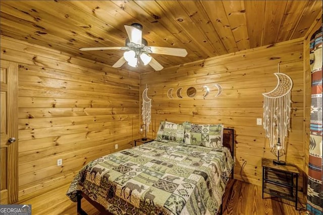 9947 Doublehead Gap Rd, Blue Ridge, GA 30513 - bedroom featuring wood ceiling, wood walls, wood finished floors, and a ceiling fan