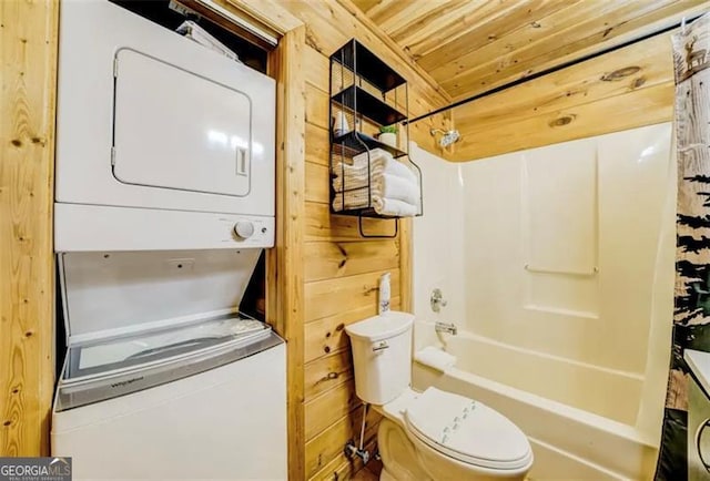 9947 Doublehead Gap Rd, Blue Ridge, GA 30513 - bathroom featuring stacked washer and clothes dryer, wooden ceiling, shower / bath combo with shower curtain, and wood walls