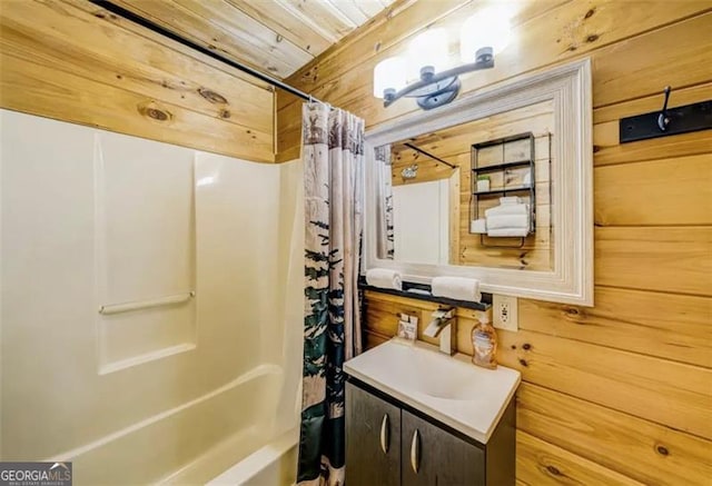 9947 Doublehead Gap Rd, Blue Ridge, GA 30513 - bathroom with vanity, shower / bath combo with shower curtain, and wood walls