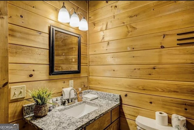 9947 Doublehead Gap Rd, Blue Ridge, GA 30513 - half bathroom with wooden walls and vanity