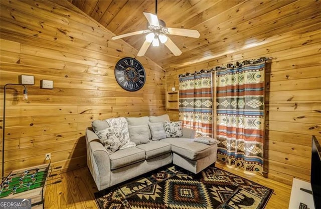9947 Doublehead Gap Rd, Blue Ridge, GA 30513 - living area with vaulted ceiling, a ceiling fan, wooden ceiling, wood finished floors, and wood walls