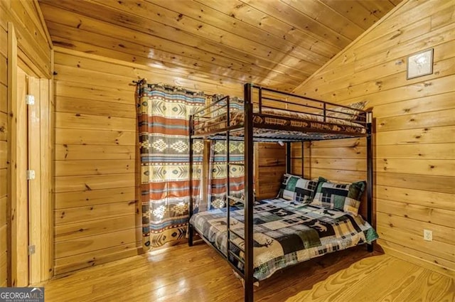 9947 Doublehead Gap Rd, Blue Ridge, GA 30513 - bedroom with vaulted ceiling, wood walls, wood finished floors, and wood ceiling