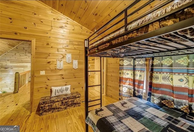 9947 Doublehead Gap Rd, Blue Ridge, GA 30513 - unfurnished bedroom with vaulted ceiling, wood ceiling, wooden walls, and wood finished floors