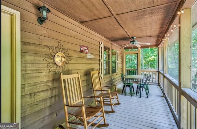 9947 Doublehead Gap Rd, Blue Ridge, GA 30513 - sunroom / solarium featuring ceiling fan and outdoor dining area
