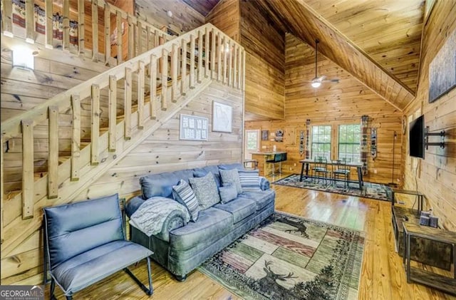 9947 Doublehead Gap Rd, Blue Ridge, GA 30513 - living room featuring wooden walls, hardwood / wood-style flooring, wood ceiling, and high vaulted ceiling