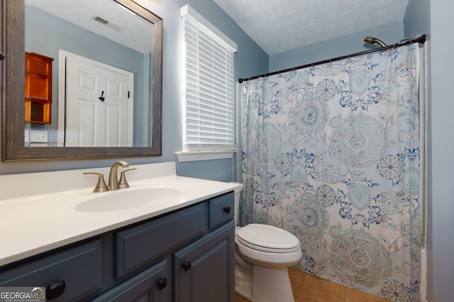 67 Granite Ct, Dallas, GA 30132 - bathroom featuring vanity, tile patterned flooring, a textured ceiling, and a shower with shower curtain