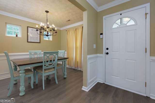 67 Granite Ct, Dallas, GA 30132 - dining room with a chandelier, dark wood-style flooring, wainscoting, a decorative wall, and crown molding