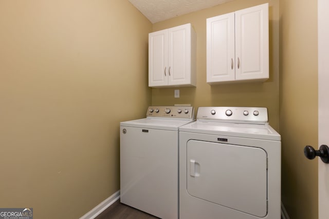 67 Granite Ct, Dallas, GA 30132 - washroom with independent washer and dryer, cabinet space, and dark wood finished floors
