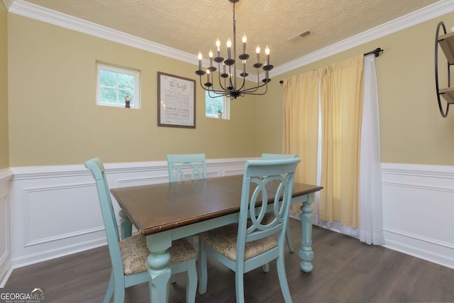 67 Granite Ct, Dallas, GA 30132 - dining area featuring a chandelier, dark wood-style flooring, wainscoting, and a decorative wall