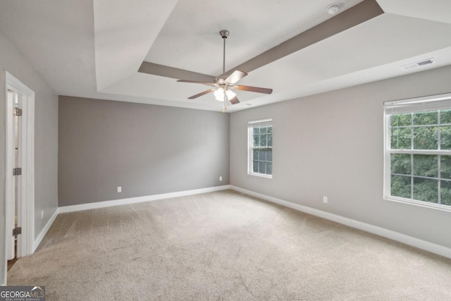 176 Windy Cir, Mcdonough, GA 30253 - carpeted spare room with a smoke detector, a ceiling fan, and a tray ceiling