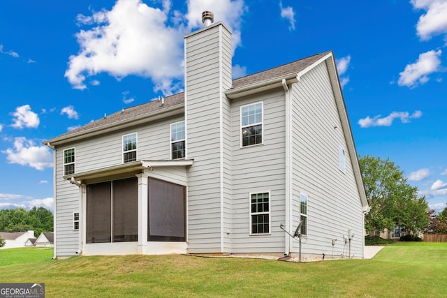176 Windy Cir, Mcdonough, GA 30253 - rear view of property featuring a chimney, a lawn, and a sunroom