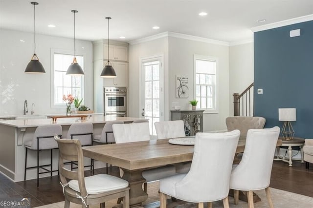 385 Rowes Cir, Alpharetta, GA 30009 - dining area featuring dark wood-type flooring, recessed lighting, ornamental molding, and stairway