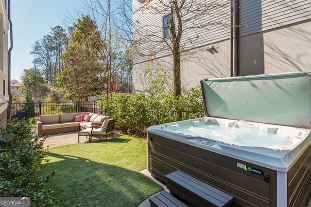 385 Rowes Cir, Alpharetta, GA 30009 - fenced backyard with a hot tub and an outdoor hangout area