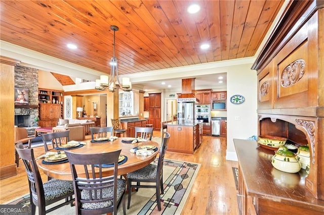 44 Sassafras Rdg, Big Canoe, GA 30143 - dining space with a stone fireplace, wooden ceiling, ornamental molding, light wood-style flooring, and recessed lighting