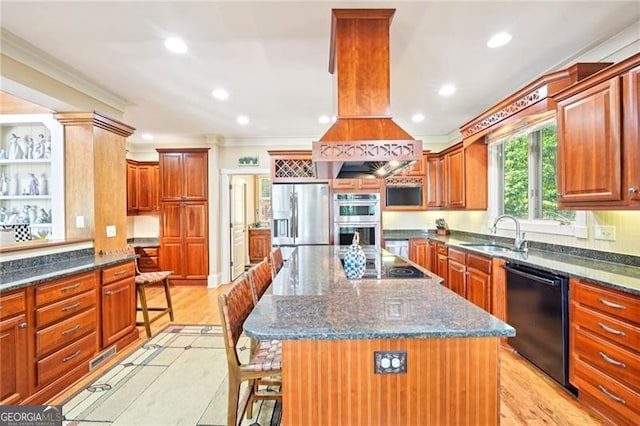44 Sassafras Rdg, Big Canoe, GA 30143 - kitchen with black appliances, a kitchen breakfast bar, crown molding, recessed lighting, and dark stone countertops