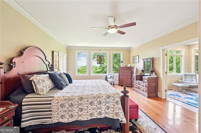 44 Sassafras Rdg, Big Canoe, GA 30143 - bedroom with crown molding, light wood finished floors, and ceiling fan