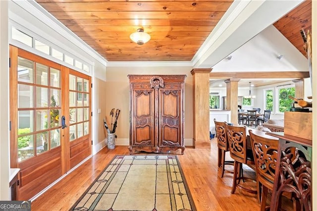 44 Sassafras Rdg, Big Canoe, GA 30143 - foyer entrance featuring decorative columns, wooden ceiling, ornamental molding, french doors, and light wood-style flooring