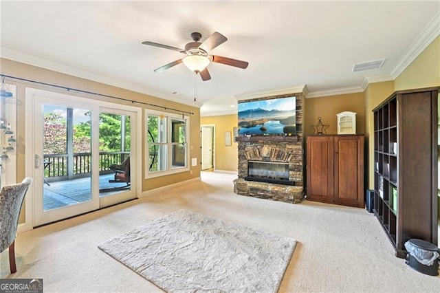 44 Sassafras Rdg, Big Canoe, GA 30143 - unfurnished living room with light colored carpet, crown molding, a fireplace, and healthy amount of natural light