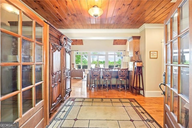 44 Sassafras Rdg, Big Canoe, GA 30143 - entrance foyer featuring crown molding, french doors, wood finished floors, and wood ceiling