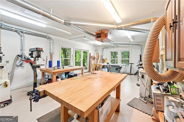 44 Sassafras Rdg, Big Canoe, GA 30143 - dining area featuring finished concrete floors and a workshop area